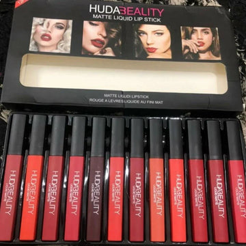 Pack of Huda Beauty Lip Strobe Metallic Lip Gloss
